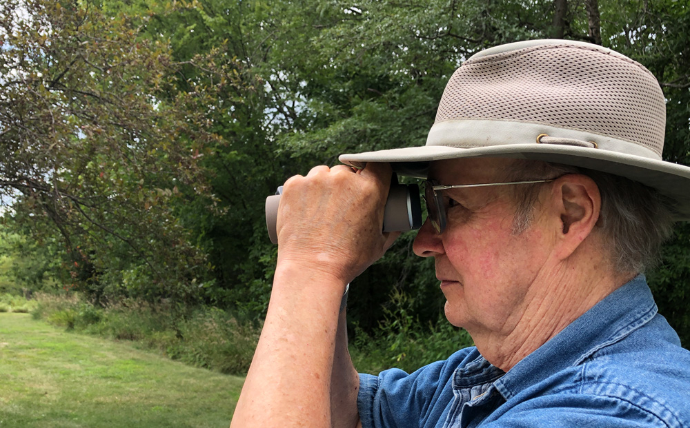 Birder with binoculars